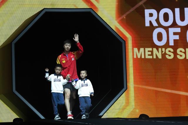 开云体育下载-马龙携子亮相大满贯赛场 36岁的老将还想赢还能赢